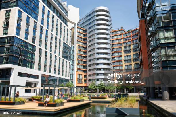 view of the paddington basin and residential architecture in london - city road basin london stock pictures, royalty-free photos & images