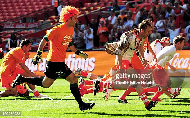 Goalkeeper Matt Gilks and Brett Ormerod of Blackpool celebrate after the Coca Cola Championship Playoff Final between Blackpool and Cardiff City at...