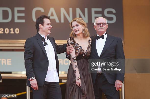 Actor Oleg Menshikov, actress Nadezhda Mihalkova and director Nikita Mikhalkov attend the "The Exodus - Burnt By The Sun" Premiere at the Palais des...
