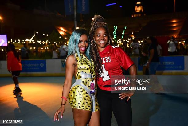 Guest poses with Msss Kamille during HBO's Mixtapes & Roller Skates at the Blue Cross RiverRink in Philadelphia, Pennsylvania on July 19, 2018 in...
