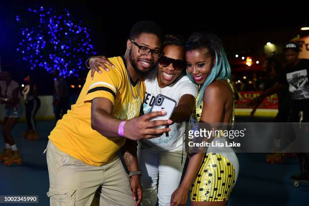 Guest pose with Msss Kamille during HBO's Mixtapes & Roller Skates at the Blue Cross RiverRink in Philadelphia, Pennsylvania on July 19, 2018 in...