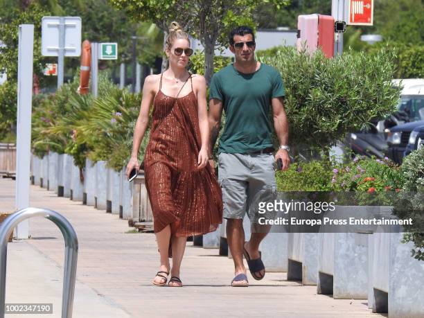 Luis Figo and Helen Svedin are seen on July 19, 2018 in Ibiza, Spain.