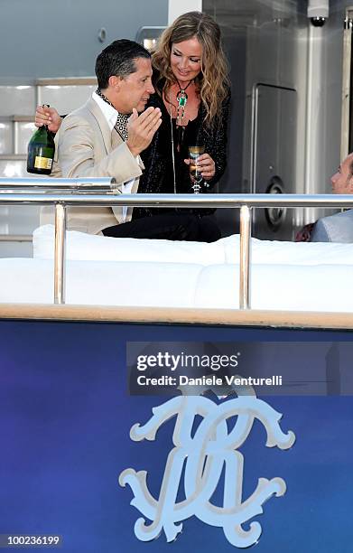 Fashion editor Stefano Tonchi and Eva Cavalli depart for Naomi Campbell's birthday party during the 63rd Annual International Cannes Film Festival on...