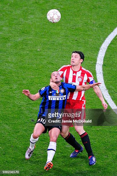 Wesley Sneijder of Inter Milan is challenged by Mark van Bommel of Bayern Muenchen during the UEFA Champions League Final match between FC Bayern...