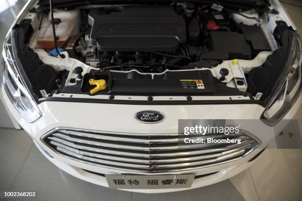 Ford Motor Co. Escort vehicle stands on display at a Ford dealership in Shanghai, China, on Thursday, July 19, 2018. The fledgling U.S.-China trade...