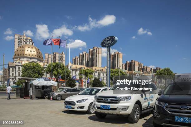 Ford Motor Co. Vehicles stand on display at a Ford dealership in Shanghai, China, on Thursday, July 19, 2018. The fledgling U.S.-China trade war will...