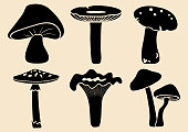 Set of different mushrooms. Black silhouette. Vector illustration