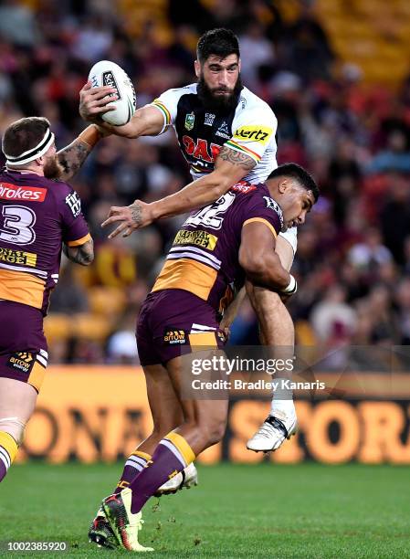 James Tamou of the Panthers is picked up in the tackle during the round 19 NRL match between the Brisbane Broncos and the Penrith Panthers at Suncorp...