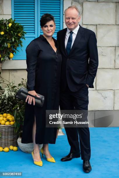 Megan Everett and Stellan Skarsgard attend the UK Premiere of "Mamma Mia! Here We Go Again" at Eventim Apollo on July 16, 2018 in London, England.