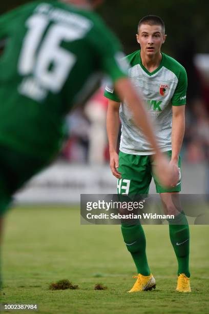 Lukas Petkov of Augsburg looks on during the pre-season friendly match between SC Olching and FC Augsburg on July 19, 2018 in Olching, Germany.