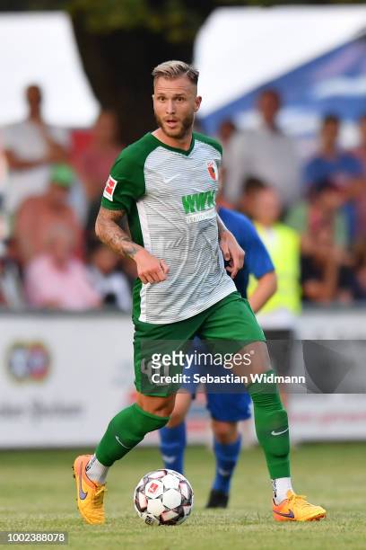 Tim Rieder of Augsburg plays the ball during the pre-season friendly match between SC Olching and FC Augsburg on July 19, 2018 in Olching, Germany.