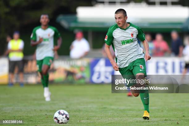 Lukas Petkov of Augsburg plays the ball during the pre-season friendly match between SC Olching and FC Augsburg on July 19, 2018 in Olching, Germany.