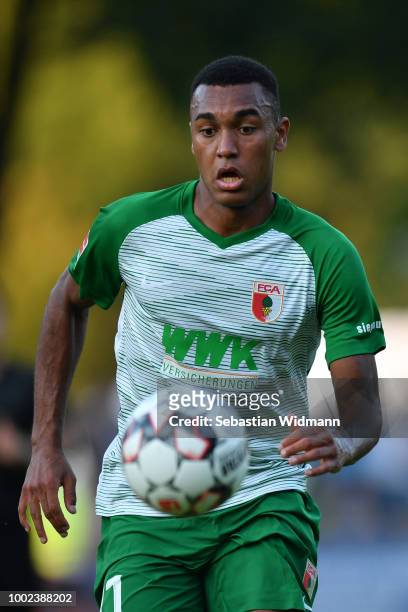 Maurice Malone of Augsburg plays the ball during the pre-season friendly match between SC Olching and FC Augsburg on July 19, 2018 in Olching,...