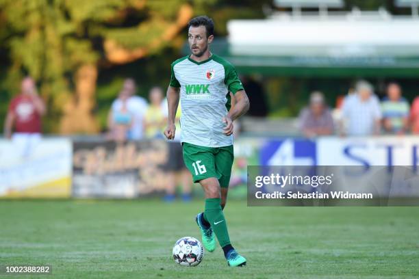 Christoph Janker of Augsburg plays the ball during the pre-season friendly match between SC Olching and FC Augsburg on July 19, 2018 in Olching,...