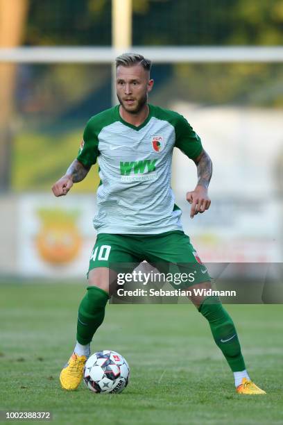 Tim Rieder of Augsburg plays the ball during the pre-season friendly match between SC Olching and FC Augsburg on July 19, 2018 in Olching, Germany.