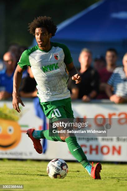 Francisco da Silva Caiuby of Augsburg plays the ball during the pre-season friendly match between SC Olching and FC Augsburg on July 19, 2018 in...