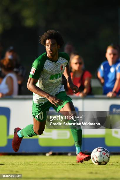 Francisco da Silva Caiuby of Augsburg plays the ball during the pre-season friendly match between SC Olching and FC Augsburg on July 19, 2018 in...