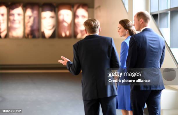 Britain's Prince William and his wife Catherine, Duchess of Cambridge, visit the museum of the Holocaust Memorial in Berlin, Germany, 19 July 2017....