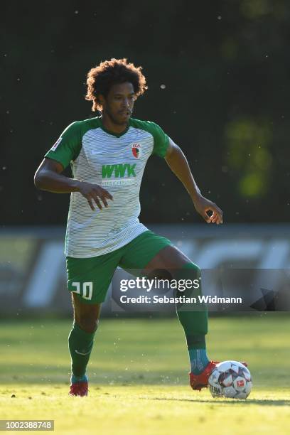 Francisco da Silva Caiuby of Augsburg plays the ball during the pre-season friendly match between SC Olching and FC Augsburg on July 19, 2018 in...