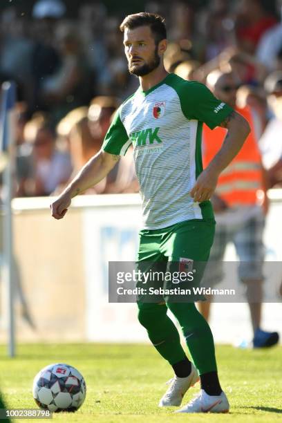 Marcel Heller of Augsburg plays the ball during the pre-season friendly match between SC Olching and FC Augsburg on July 19, 2018 in Olching, Germany.