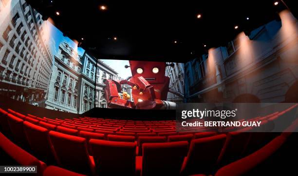 This picture taken on July 20, 2018 shows a cinema room with Screen X projector at Pathe cinema in Parc de La Villette, in Paris.