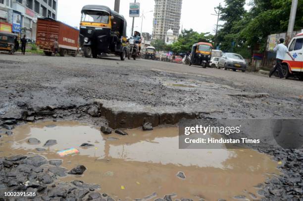 The recent heavy spell of showers have increased the problem of commuters as huge potholes have appeared on various roads in the city after rain, at...