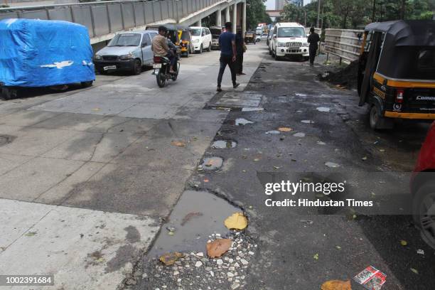 The recent heavy spell of showers have increased the problem of commuters as huge potholes have appeared on various roads in the city after rain, on...