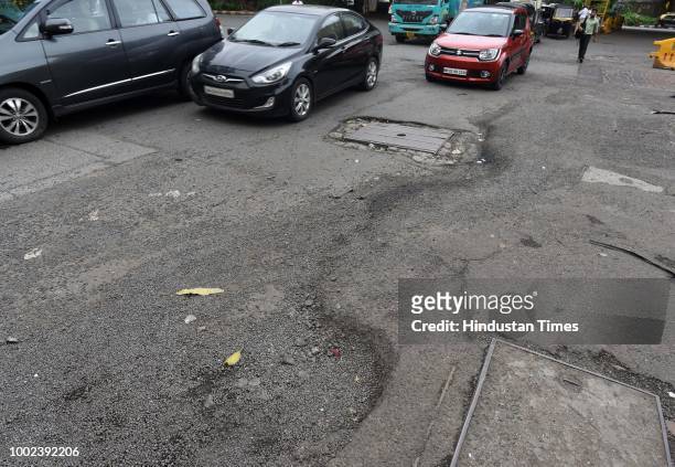 The recent heavy spell of showers have increased the problem of commuters as huge potholes have appeared on various roads in the city after rain, at...