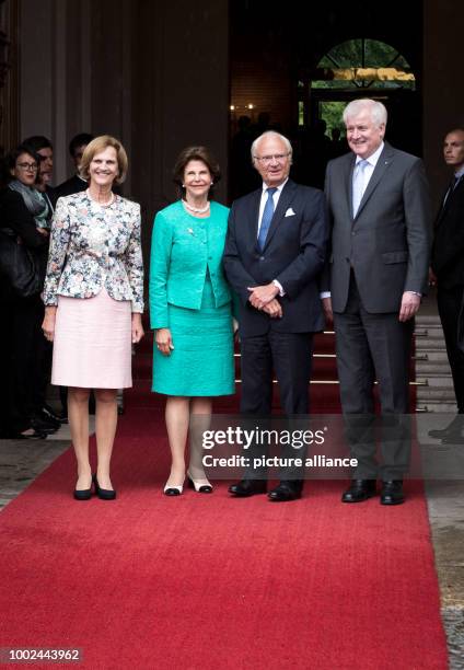 Karin Seehofer , Queen Silvia of Sweden, King Carl Gustaf of Sweden and Bavarian premier Horst Seehofer outside the Prinz-Carl-Palais in Munich,...