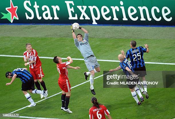 Inter Milan's Brazilian goalkeeper Julio Cesar grabs the ball during the UEFA Champions League final football match Inter Milan against Bayern Munich...