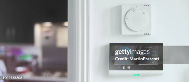 smart meter readings in the home - electric meter house stock pictures, royalty-free photos & images