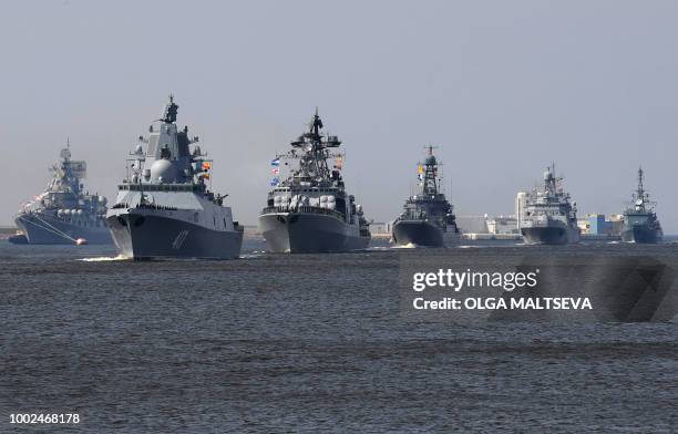 Russian navy ships, among them Russian Navy Frigate 'Admiral Gorshkov , sail near Kronshtadt naval base outside Saint Petersburg on July 20 during a...