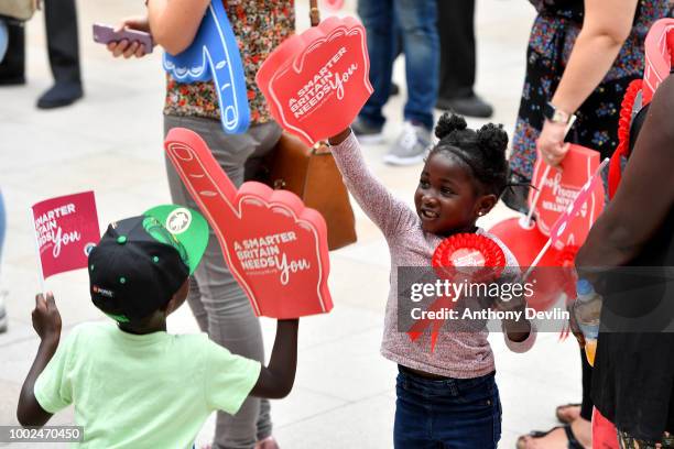 Children play with foam hands as Phil Spencer and Olivia Lee speak at Trinity Shopping as part of the Smart Energy GB campaign to inspire the nation...