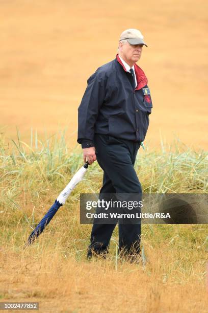 Prince Andrew, The Duke of York looks on from the side of the 2nd fairway during round two of the Open Championship at Carnoustie Golf Club on July...
