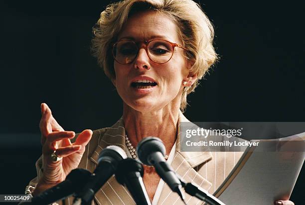 female conference speaker - politicians female stock pictures, royalty-free photos & images