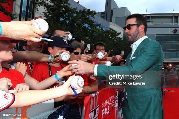 Justin Verlander of the Houston Astros and the American League signs autographs for fans at the 89th MLB All-Star Game, presented by MasterCard red...