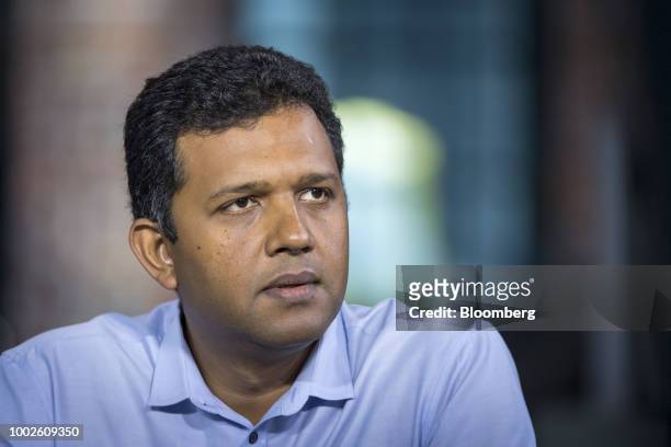 Guru Hariharan, chief executive officer of Boomerang Commerce Inc., listens during a Bloomberg Technology Television interview in San Francisco,...