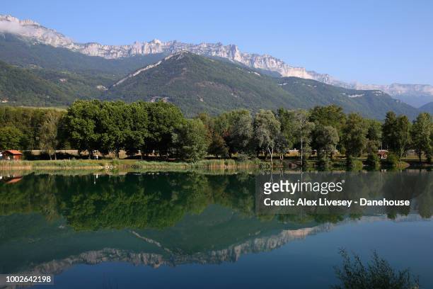 Alpe St Bernard du Touvet is seen from Lac de La Terrasse prior to Stage 12 of the 105th Tour de France 2018, on July 19, 2018 in Alpe d'Huez, France.