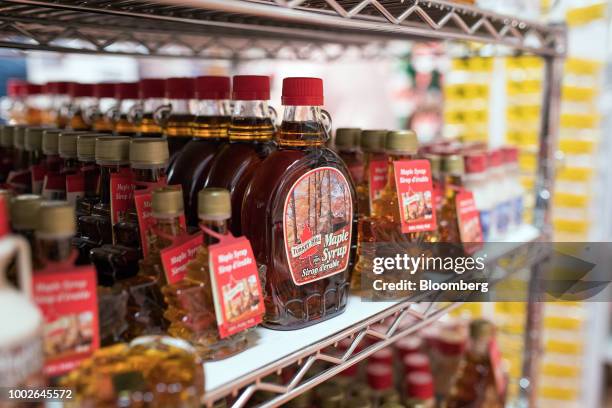 Maple syrup sits on display for sale at a store in downtown Victoria, British Columbia, Canada, on Friday, July 13, 2018. Canadian tourism spending...