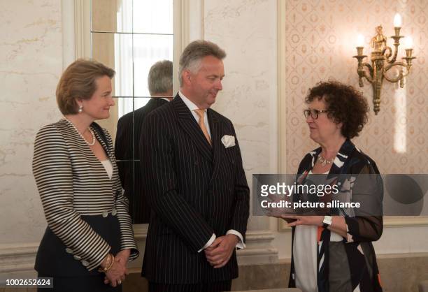 Gerlinde Kretschmann , wife of Winfried Kretschmann , premier of German state Baden-Wuerttemberg, talks to Friedrich Duke of Wuerttemberg and Marie...