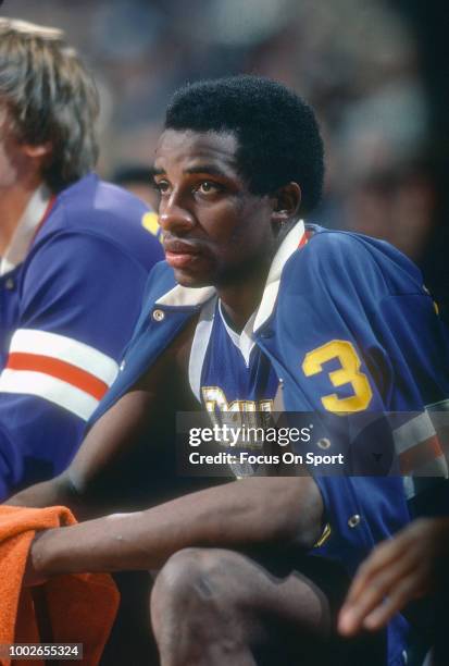 David Thompson of the Denver Nuggets looks on from the bench against the Washington Bullets during an NBA basketball game circa 1978 at the Capital...