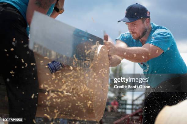 Nathan Waterfield of Cherry Valley, New York competes in a Single Buck sawing competition at the Lumberjack World Championships on July 19, 2018 in...