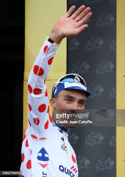 Julian Alaphilippe of France and Quick Step Floors retains the dot jersey of best climber on the podium following stage 13th of Le Tour de France...