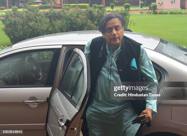 Congress MP Shashi Tharoor arrives to attend third day of the Monsoon Session of Parliament, on July 20, 2018 in New Delhi, India. A debate is under...