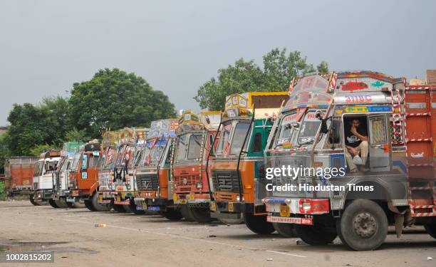 Trucks are seen parked at sector 26 during a strike called by the transporters on July 20, 2018 in Chandigarh, India.