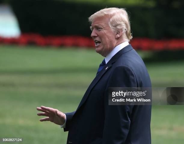 President Donald Trump waves as he walks to Marine One while departing from the White House on July 20, 2018 in Washington, DC. President Trump is...