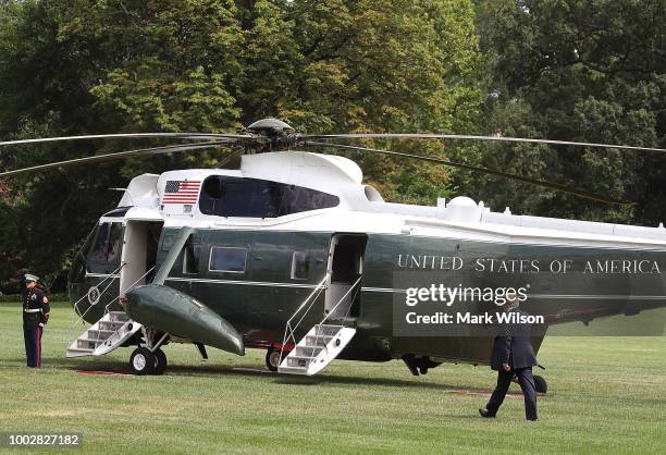 President Donald Trump walks to Marine One while departing from the White House on July 20, 2018 in Washington, DC. President Trump is traveling to...