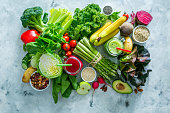 Alkaline diet concept - fresh foods on rustic background