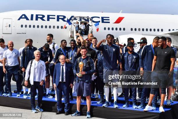 Team France with the trophy during the arrival at Airport Roissy Charles de Gaulle on July 16, 2018 in Paris, France.