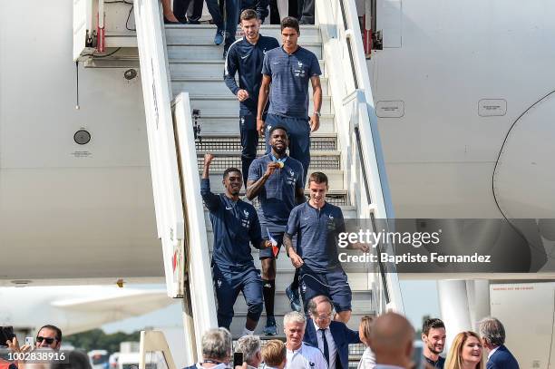 Lucas Hernandez, Raphael Varane, Samuel Umtiti, Ousmane Dembele and Antoine Griezmann of France during the arrival at Airport Roissy Charles de...